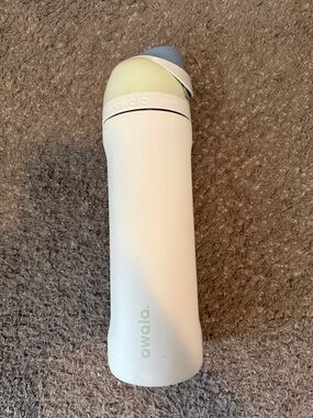 Owala Insulated Water Bottle in White with Mint & Blue Accents